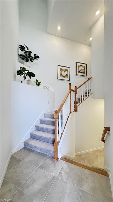 Bright two-story entry stairwell