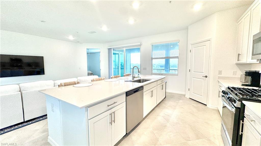 Kitchen with stainless gas range